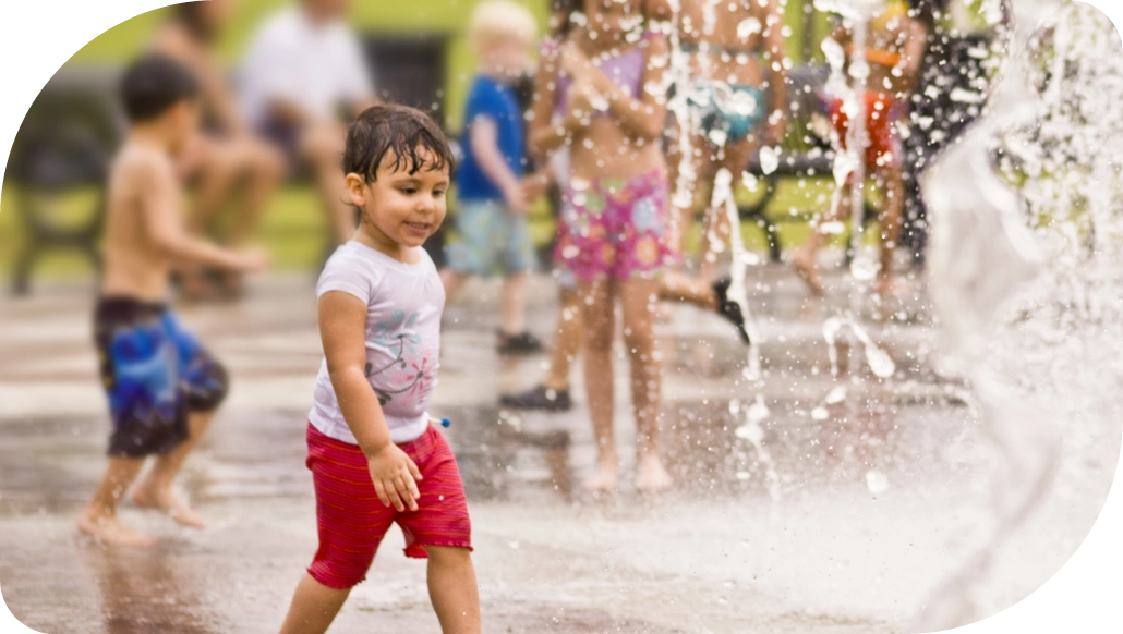 Children playing in a fountain