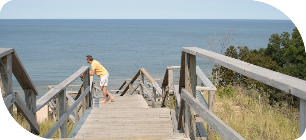 Person on a beach boardwalk